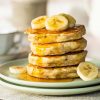 My fluffy banana pancakes are thick but light and airy and so easy to make! Perfect for a lazy weekend brunch or a quick after school snack! Recipe by movers and bakers