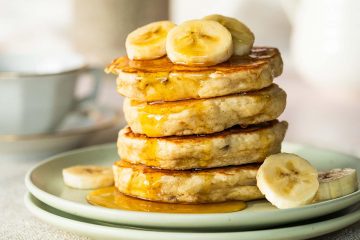 My fluffy banana pancakes are thick but light and airy and so easy to make! Perfect for a lazy weekend brunch or a quick after school snack! Recipe by movers and bakers