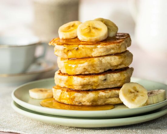 My fluffy banana pancakes are thick but light and airy and so easy to make! Perfect for a lazy weekend brunch or a quick after school snack! Recipe by movers and bakers