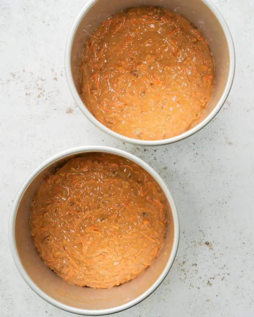 Then divide between the tins before baking. Recipe by movers and bakers