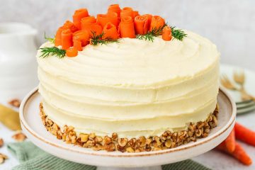 My all time favourite carrot cake recipe is so simple and easy! Deliciously light, fluffy and moist carrot cake layers, gently and perfectly spiced, are covered with a wonderful cream cheese icing. Recipe by movers and bakers