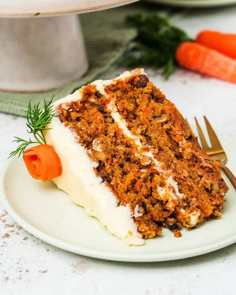 My all time favourite carrot cake recipe is so simple and easy! Deliciously light, fluffy and moist carrot cake layers, gently and perfectly spiced, are covered with a wonderful cream cheese icing. Recipe by movers and bakers