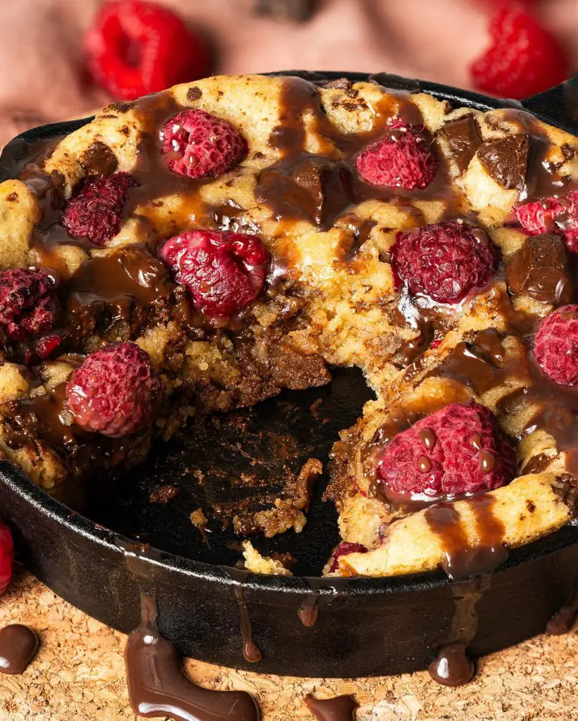 My dark chocolate raspberry skillet cookie is a delightful simple dessert for two. Perfect for Valentines, Galentines, a special anniversary or just because, everyone loves this dessert! Recipe be movers and bakers