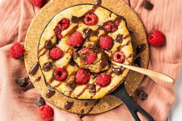 My dark chocolate raspberry skillet cookie is a delightful simple dessert for two. Perfect for Valentines, Galentines, a special anniversary or just because, everyone loves this dessert! Recipe be movers and bakers