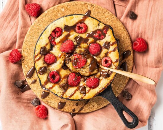 My dark chocolate raspberry skillet cookie is a delightful simple dessert for two. Perfect for Valentines, Galentines, a special anniversary or just because, everyone loves this dessert! Recipe be movers and bakers