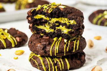 Pistachio chocolate chip cookies are chunky, chewy, chocolatey and so utterly heavenly! Filled with a generous stuffing of smooth pistachio cream, these cookies are utterly out-of-this-world decadent! Recipe by movers and bakers