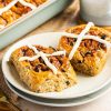These delicious hot cross cinnamon buns have all the irresistible flavours of a hot cross bun, but in a cinnamon roll! Recipe by movers and bakers