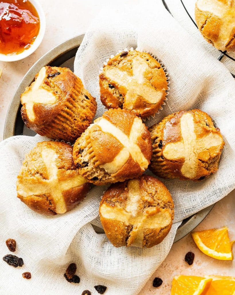 My hot cross bun muffins are a delicious (and quick!) Easter treat, perfectly combining muffins with the spices, dried fruit and citrus flavours of the traditional Easter favourite. Recipe by movers and bakers