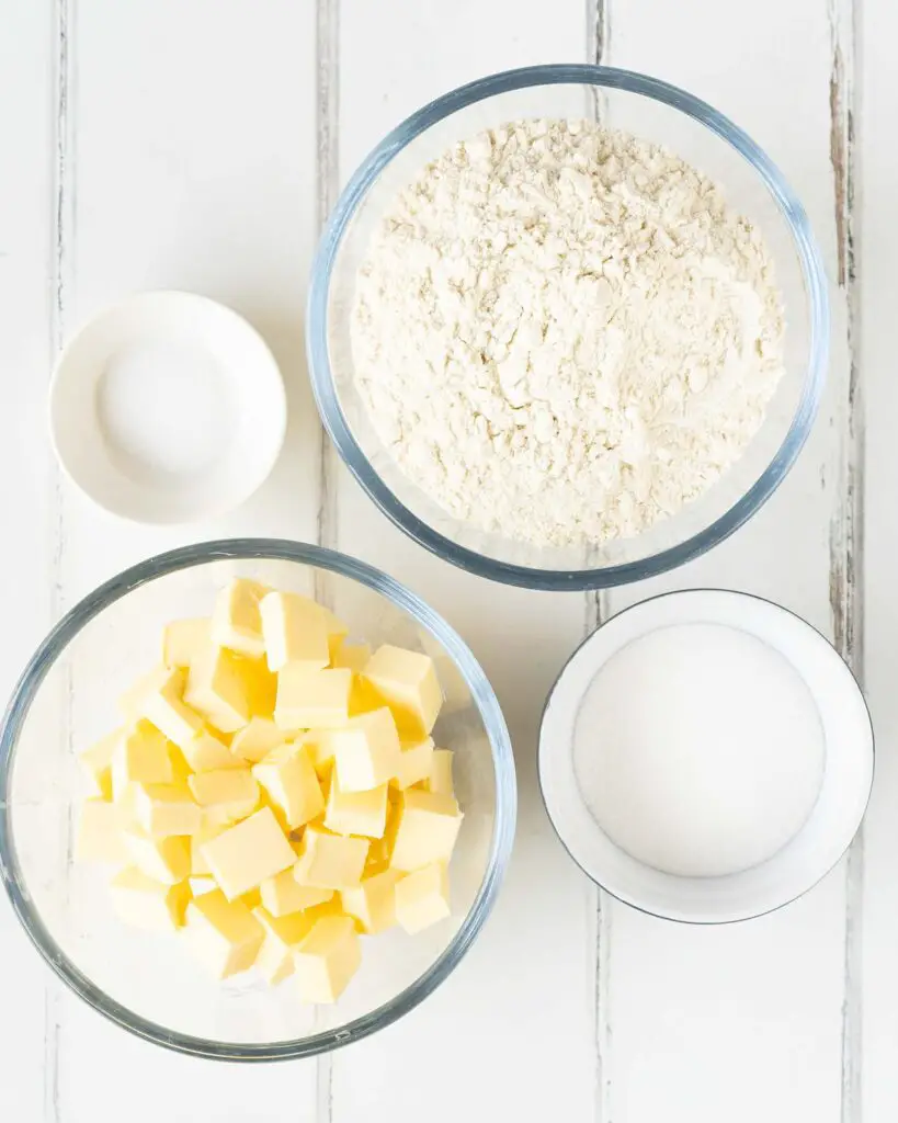 Ingredients for the base: unsalted butter, caster sugar, plain (all purpose) flour and salt. Recipe by movers and bakers