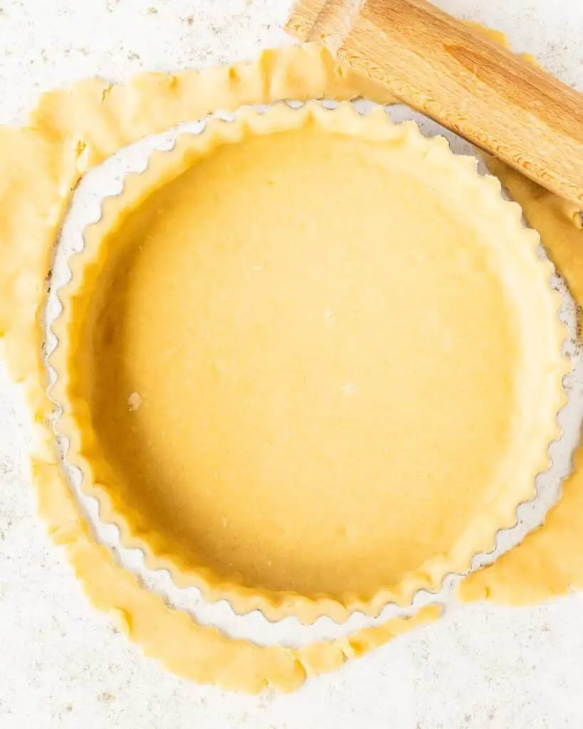 Then use a rolling pin to evenly and easily cut off the excess pastry...