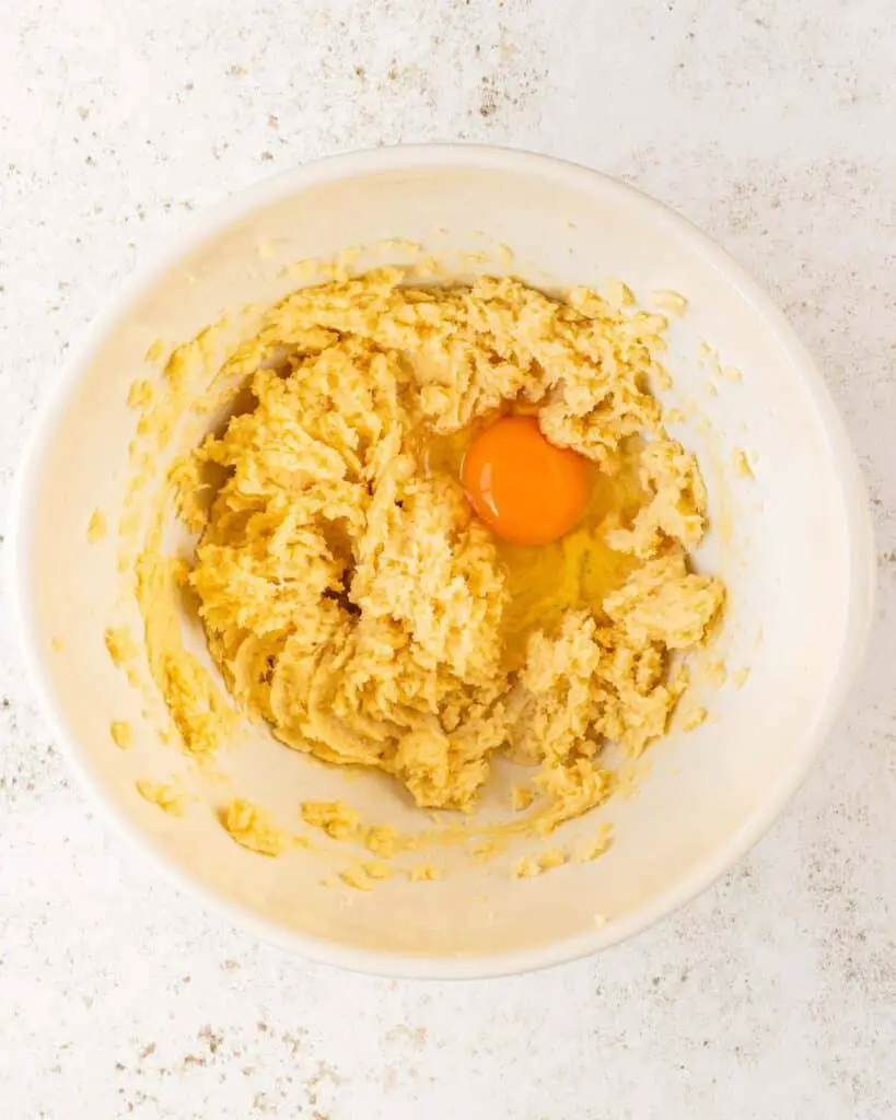 Then add in the extract and eggs one at a time, mixing between additions...
