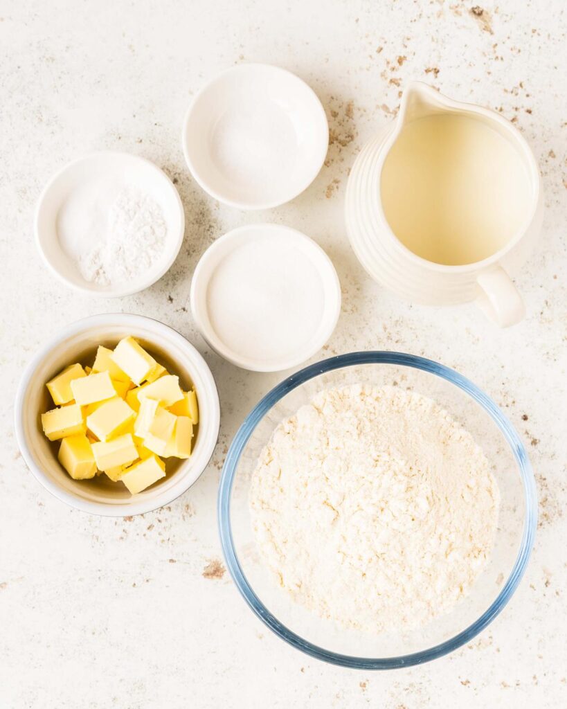 Ingredients required: plain (all purpose) flour, baking powder, bicarbonate of soda (baking soda), salt, caster sugar, unsalted butter and buttermilk. Recipe by movers and bakers