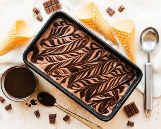 My no churn chocolate fudge ice cream is so simple to make, with just four ingredients, and is a a wonderful dessert for any chocolate lover this summer! Rich, creamy, decadent and utterly indulgent, this is an ice cream EVERYONE will love! Recipe by movers and bakers