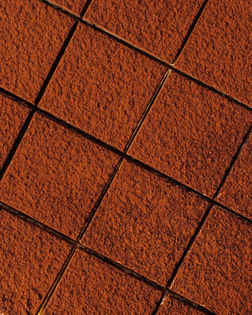 Dust generously with cocoa powder before chilling to set, then cut into squares to serve. Recipe by movers and bakers