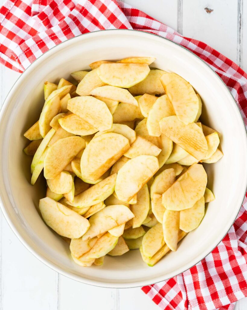 Place the sliced apples in a large bowl...