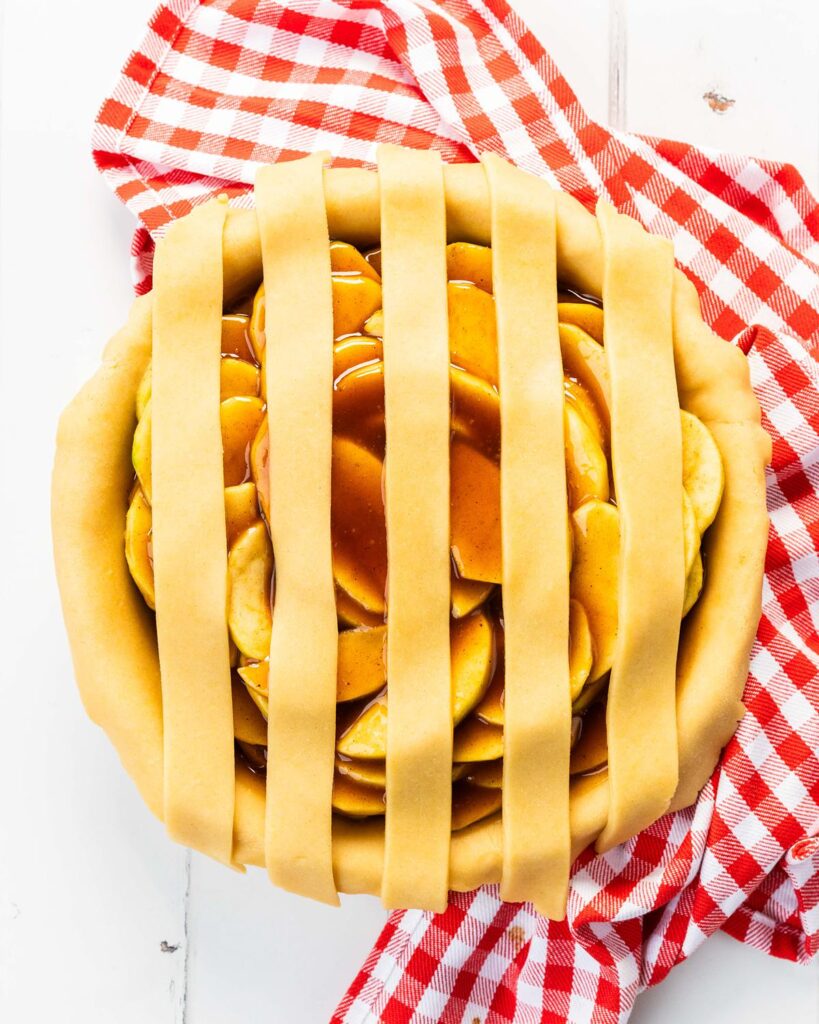 Lay five strips of pastry vertically over the filling...