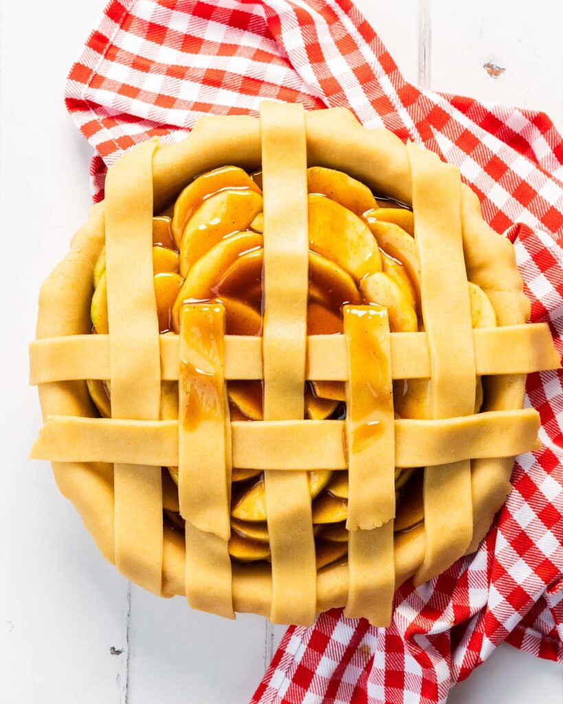 Then repeating, alternating which strips are moved for the new pastry to be placed on the pie. Recipe by movers and bakers
