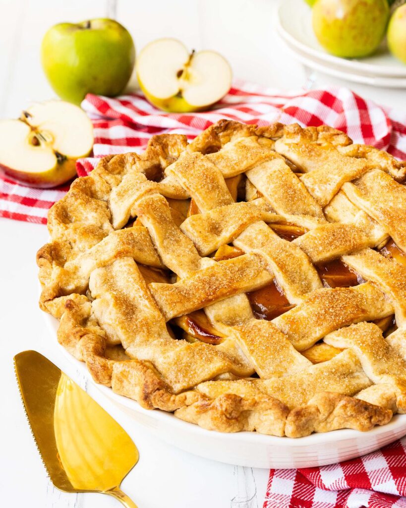 My apple pie is hearty, homely and always a popular dessert. Buttery shortcrust pastry filled with sweetly spiced apple filling topped with an adorable golden lattice crust. Recipe by movers and bakers.