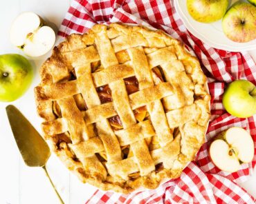 My apple pie is hearty, homely and always a popular dessert. Buttery shortcrust pastry filled with sweetly spiced apple filling topped with an adorable golden lattice crust. Recipe by movers and bakers.