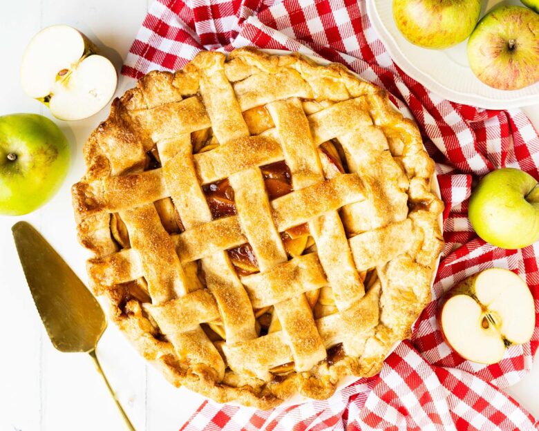 My apple pie is hearty, homely and always a popular dessert. Buttery shortcrust pastry filled with sweetly spiced apple filling topped with an adorable golden lattice crust. Recipe by movers and bakers.