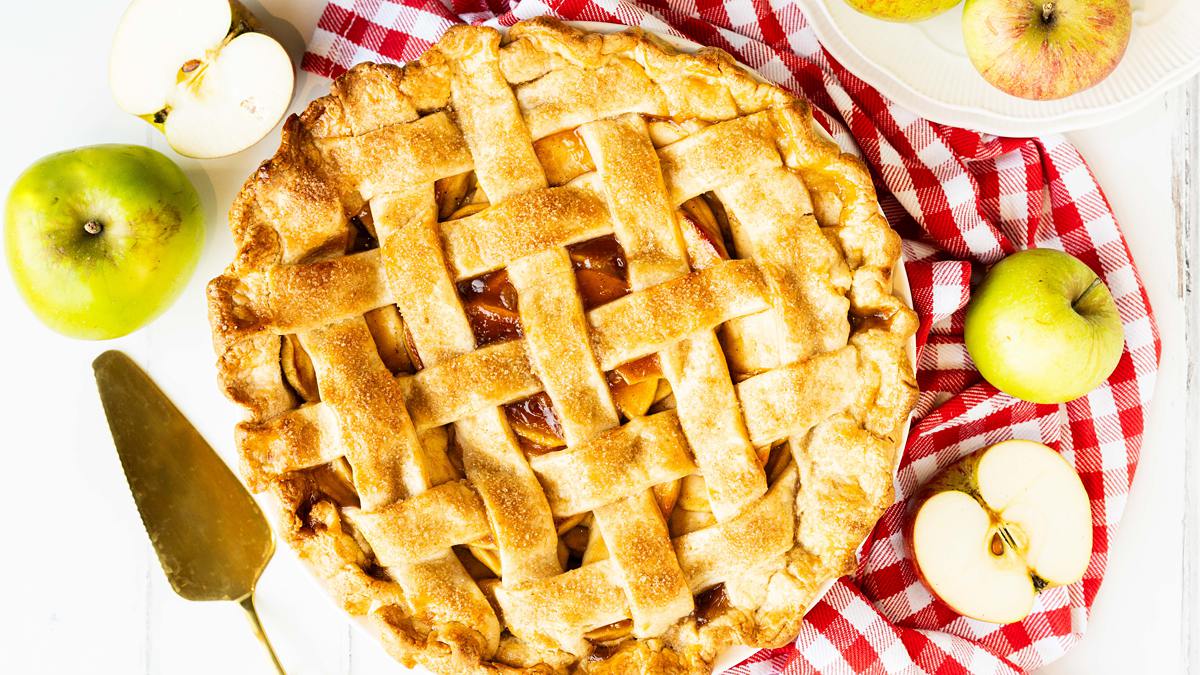My apple pie is hearty, homely and always a popular dessert. Buttery shortcrust pastry filled with sweetly spiced apple filling topped with an adorable golden lattice crust. Recipe by movers and bakers.