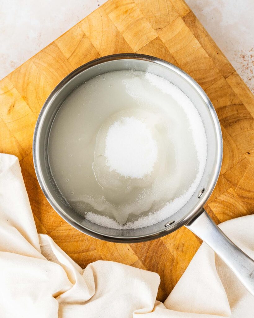 Dissolve the sugar, in the water and vinegar...