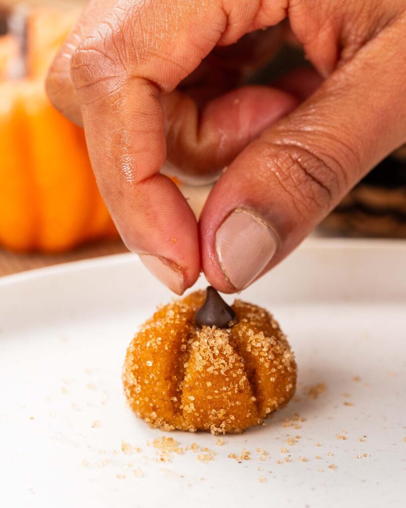 And finish with a chocolate chip "stem". Recipe by movers and bakers