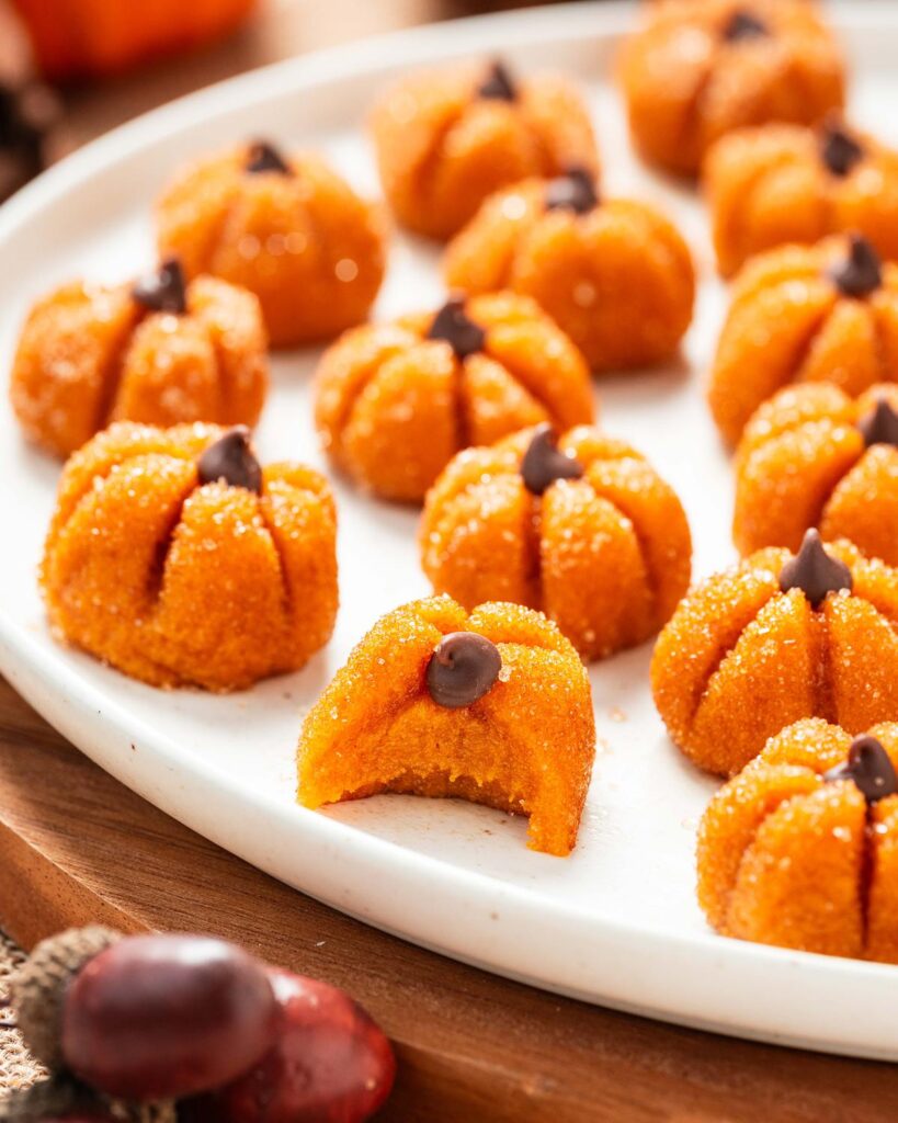 Usher in autumn with my pumpkin spice brigadeiros: creamy, spiced truffles. An easy, no-bake dessert perfect for cosy seasonal gatherings. Recipe by movers and bakers