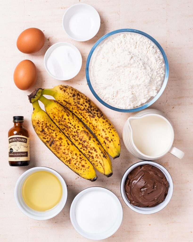Ingredients required: bananas, oil, milk, eggs, caster sugar, vanilla, plain (all purpose) flour, baking powder, bicarbonate of soda, salt and Nutella. Recipe by movers and bakers