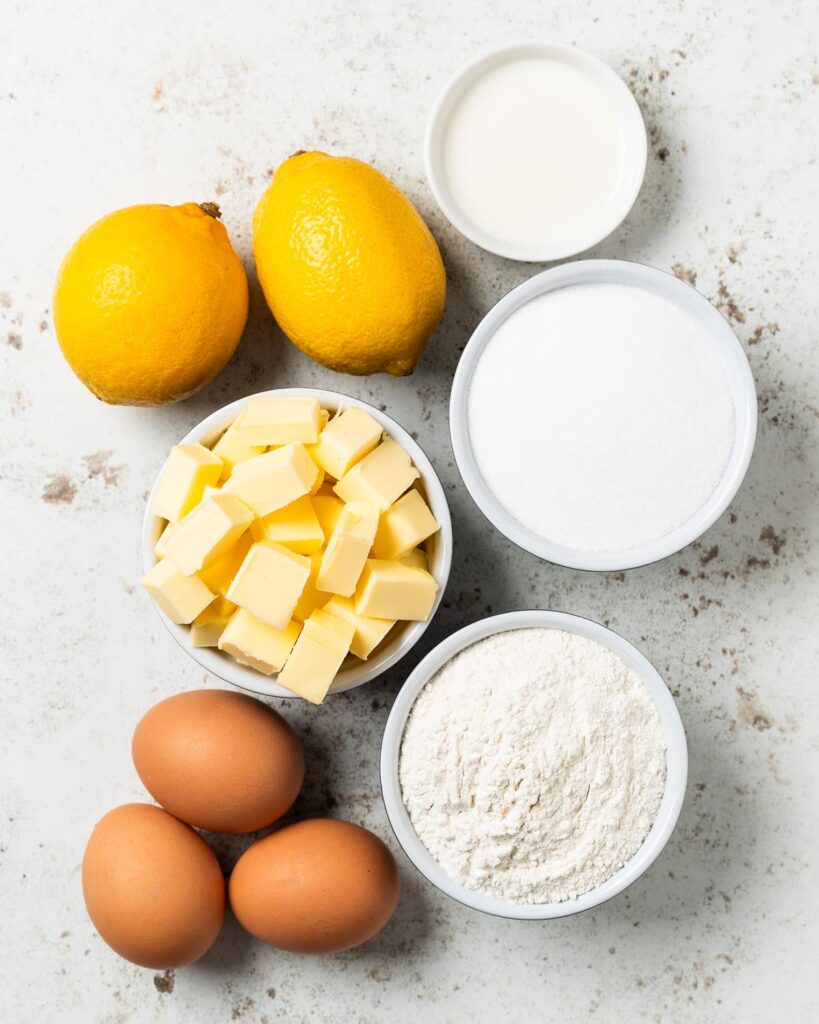 Ingredients for the cupcakes: unsalted butter, lemons, caster sugar, eggs, self raising flour and milk (optional). Recipe by movers and bakers