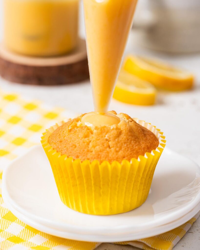 Then spoon or pipe to fill with lemon curd...