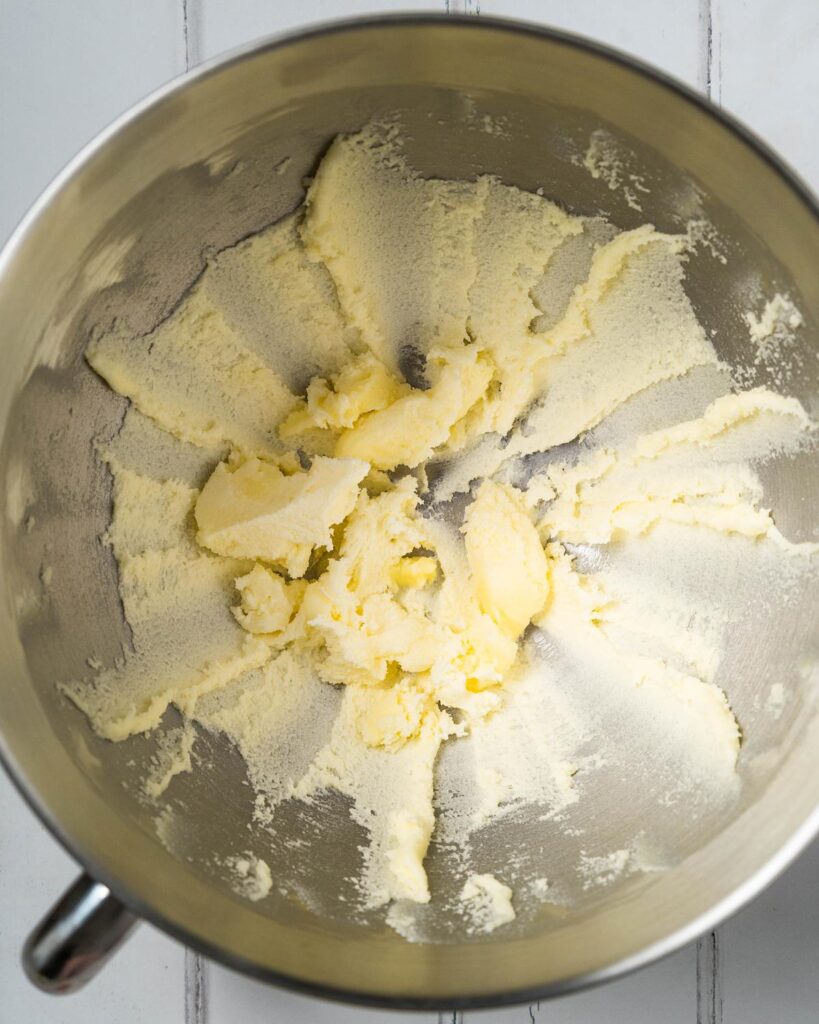 Beat the butter really thoroughly until paler and really soft and smooth. Recipe by movers and bakers