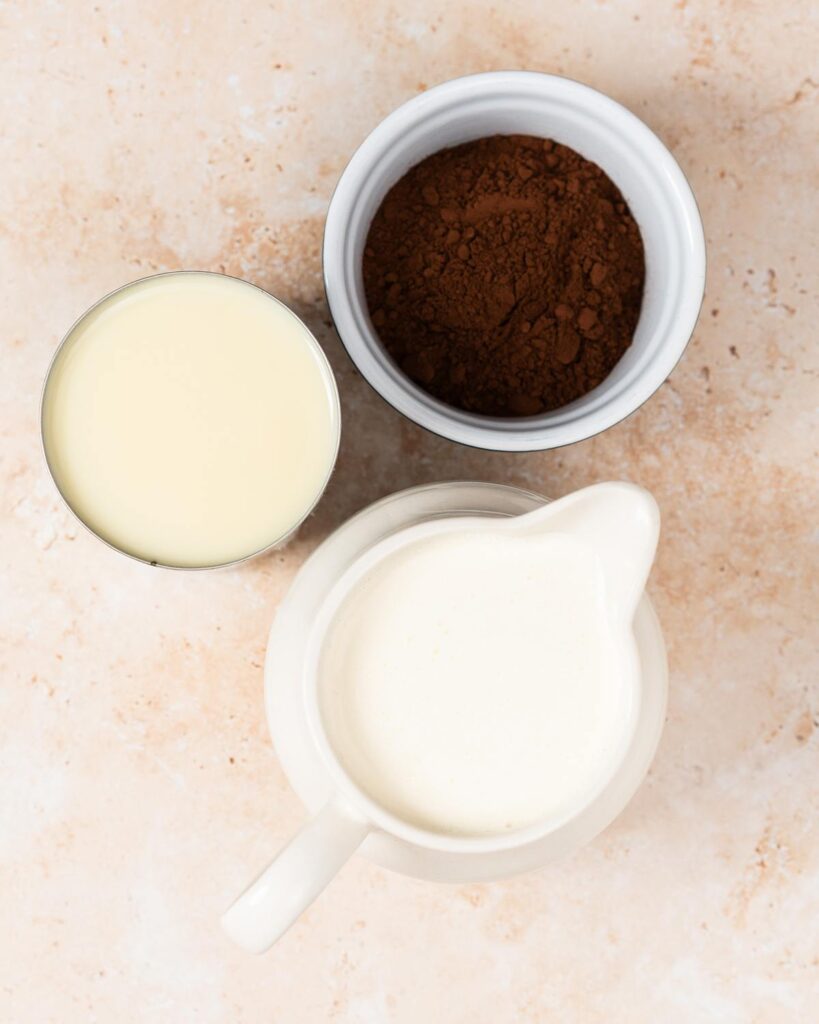Ingredients required: double (heavy) cream, sweetened condensed milk and cocoa powder. Recipe by movers and bakers