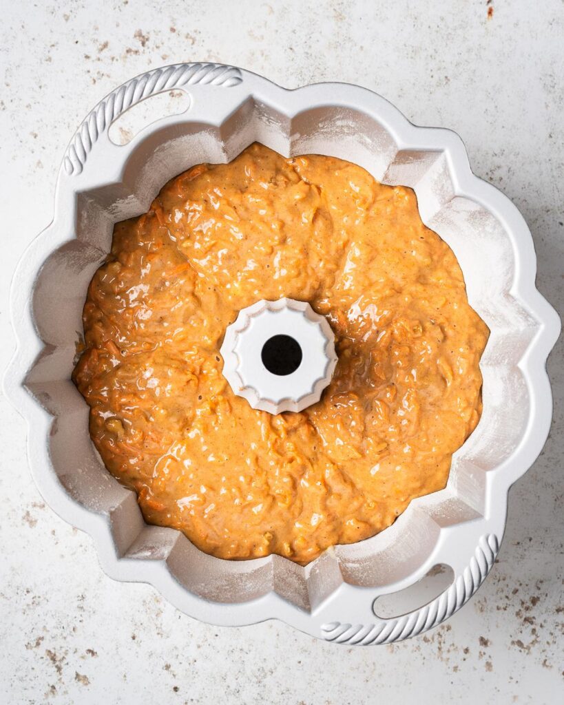 Then transfer the mixture to the prepared tin and bake. Recipe by movers and bakers