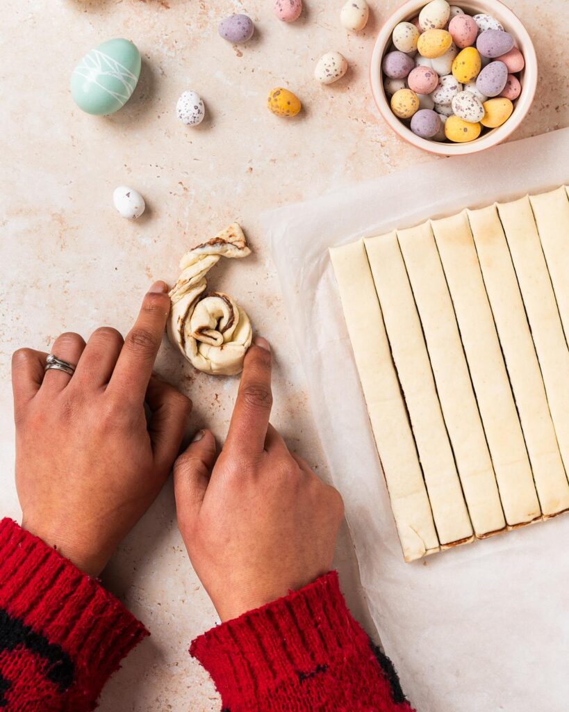 Before curling up into a nest shape, tucking the edge under. Recipe by movers and bakers