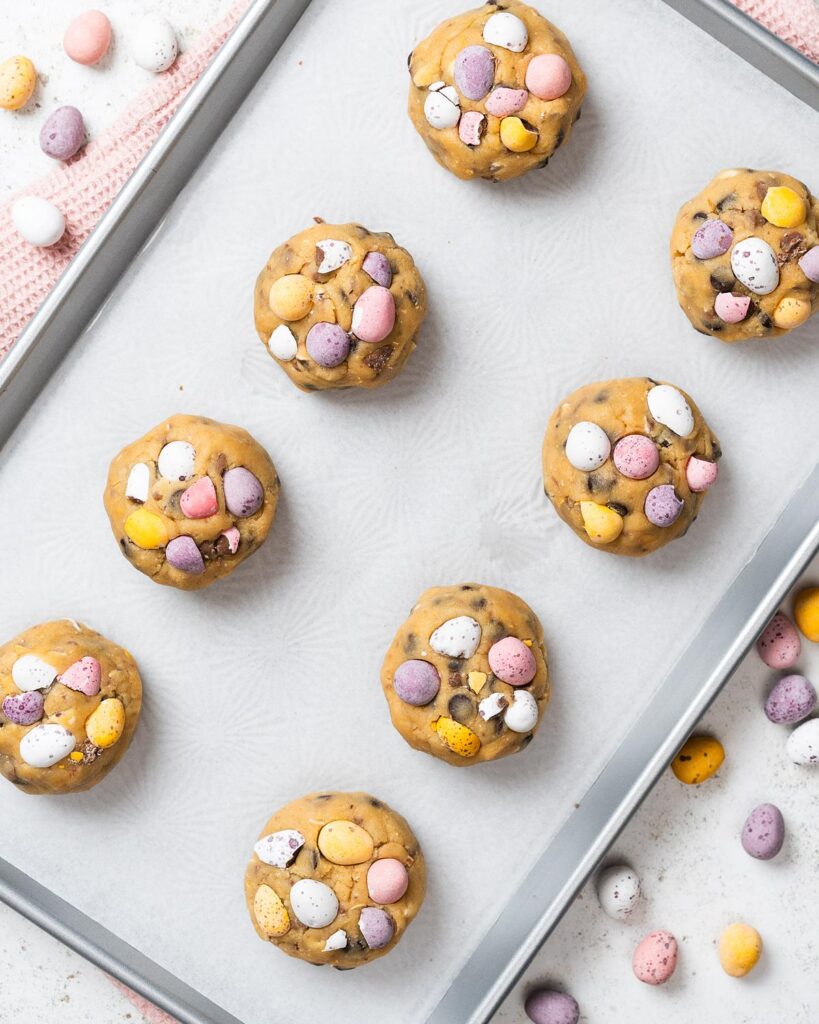 Before studding with the mini eggs set aside earlier then freezing ahead of baking. Recipe by movers and bakers