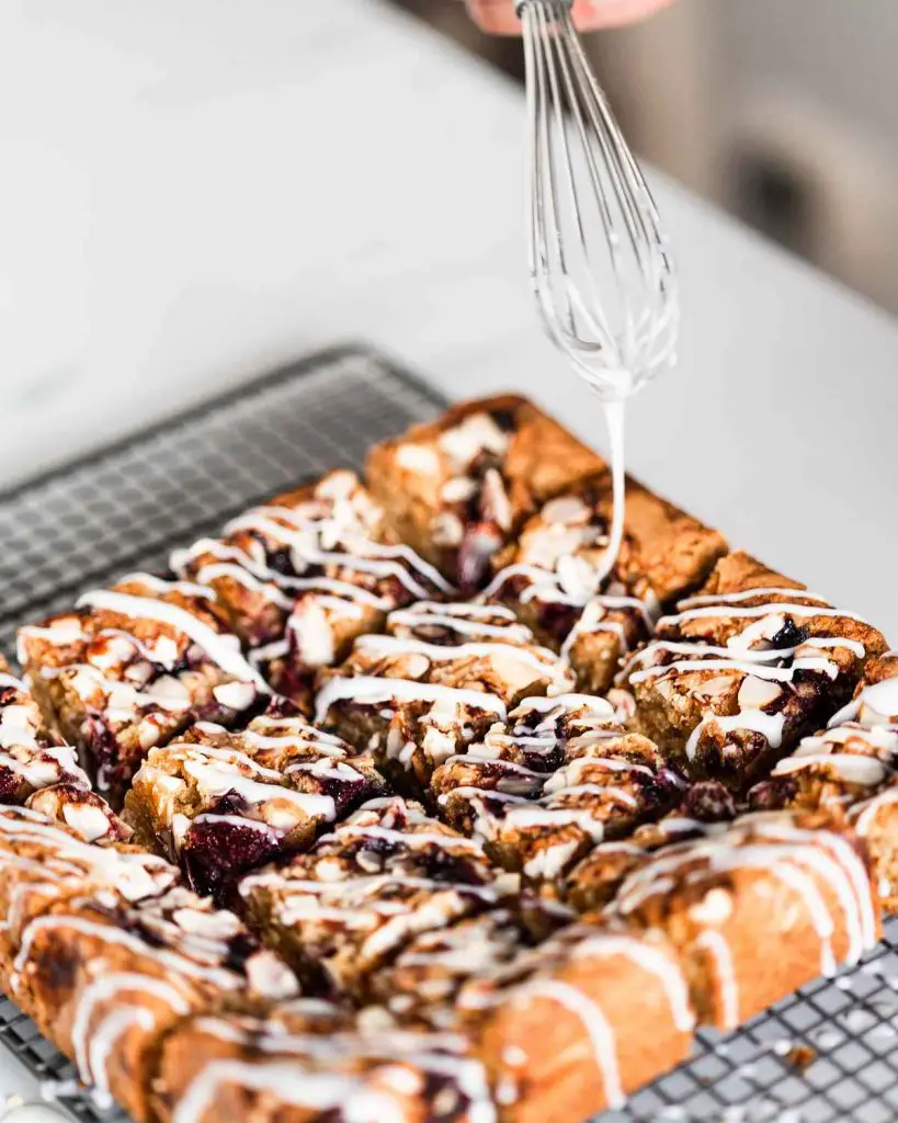 Crowning glory: the almond and cherry blondies are finished with a simple but delicious icing drizzle.