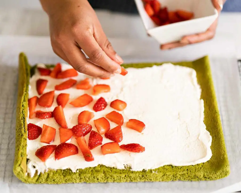 Matcha roll cake strawberries and cream