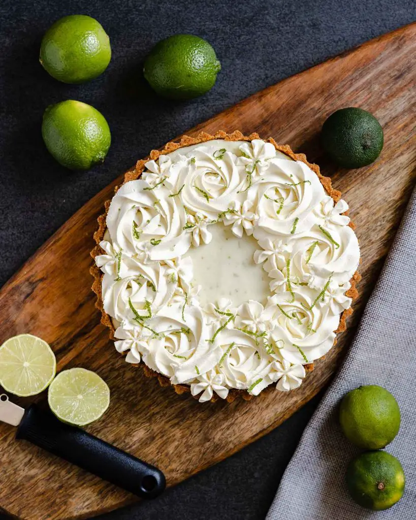 My eggless key lime pie is perfect for entertaining! Make ahead, creamy and full of flavour, this beautiful pie will be adored by everyone to tries it! Recipe by movers and bakers