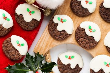These Christmas pudding cookies are not only adorably cute, but a deliciously chewy combination of brownies and cookies! Recipe by movers and bakers