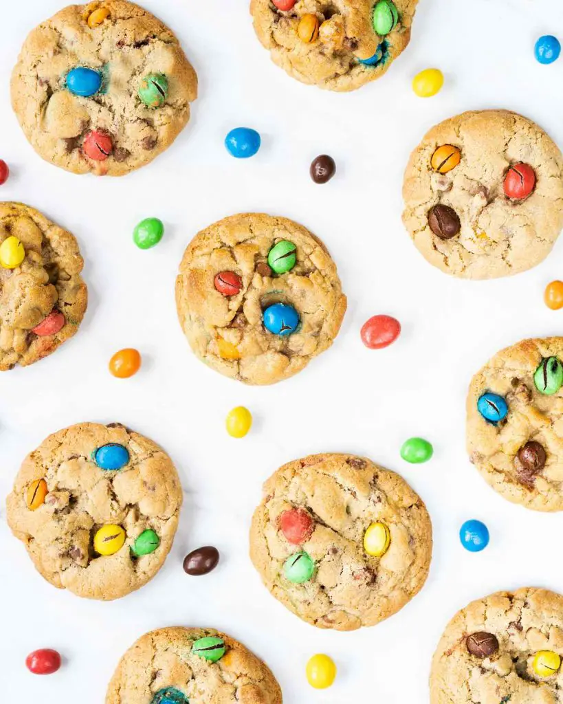 Homemade M&M cookies recipe by movers and bakers. Packed with delicious M&Ms and chocolate chips, these gorgeous cookies are crisp on the outside and wonderfully chewy on the inside. A bright and beautiful treat!