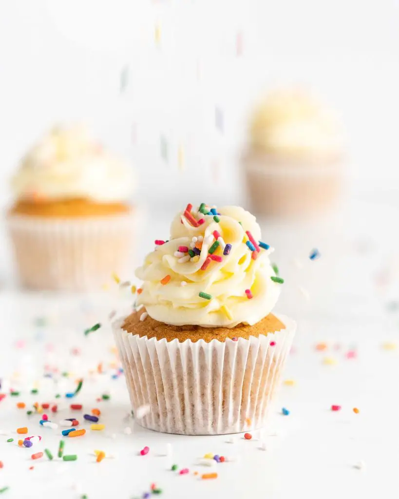 It's raining sprinkles on the best vanilla cupcakes!
