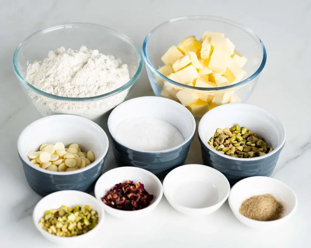 Ingredients to make rose pistachio and cardamom shortbread cookies