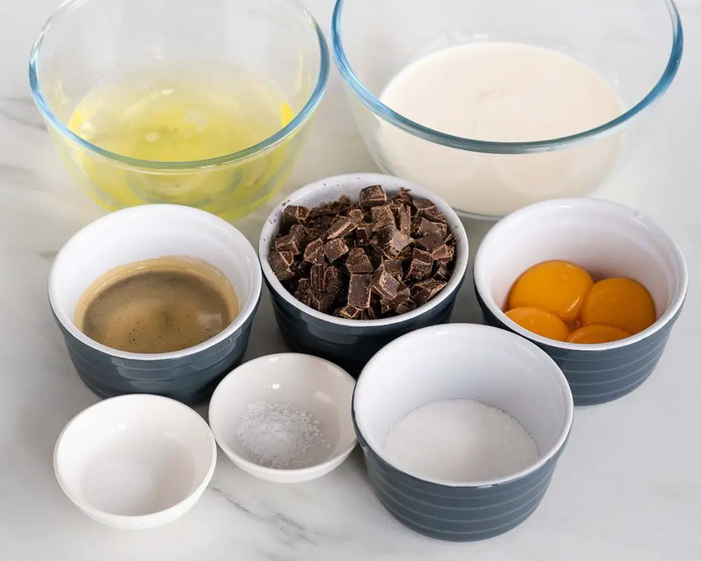 Ingredients needed for the mousse layer: double cream, 4 large eggs (separated), espresso, salt, butter, caster sugar, dark chocolate and cream of tartar. Recipe by movers and bakers