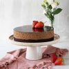My chocolate brownie mousse cake has a delicious squidgy chocolate brownie base, a silky smooth and lighter than air mousse middle and a thin cocoa mirror glaze top. Recipe by movers and bakers