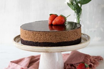 My chocolate brownie mousse cake has a delicious squidgy chocolate brownie base, a silky smooth and lighter than air mousse middle and a thin cocoa mirror glaze top. Recipe by movers and bakers
