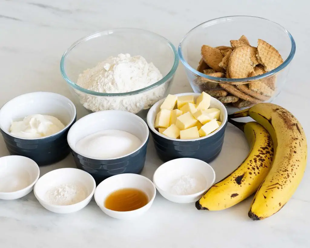 Ingredients needed: digestive biscuits, unsalted butter, caster sugar, plain (all purpose) flour, baking powder, bicarbonate of soda (baking soda), salt, eggs (not pictured), yogurt, vanilla and bananas. Recipe by movers and bakers