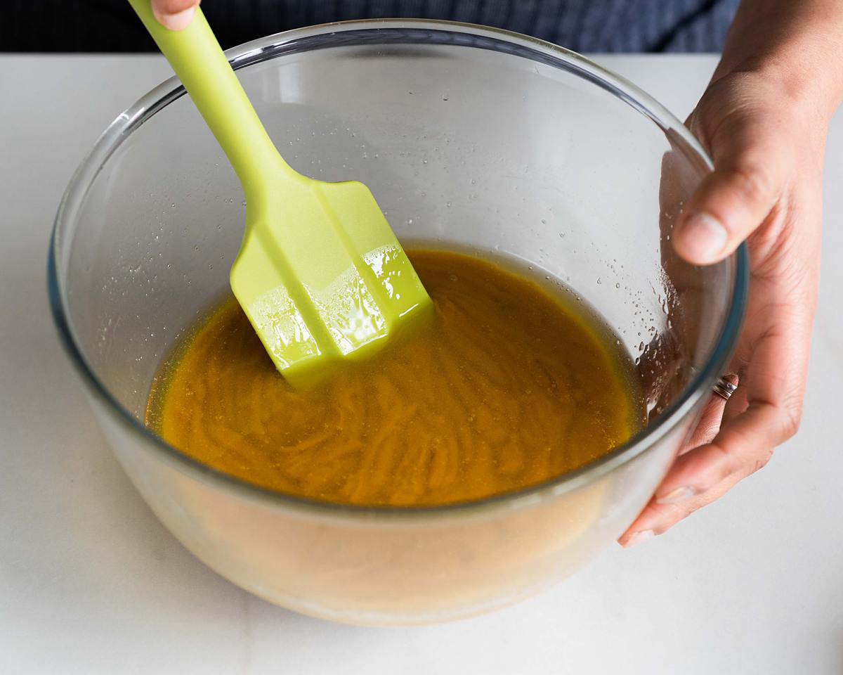 When the butter, sugar and chocolate are first melted together they will not combine. Keep stirring and mixing until it becomes one smooth mixture. Recipe by movers and bakers