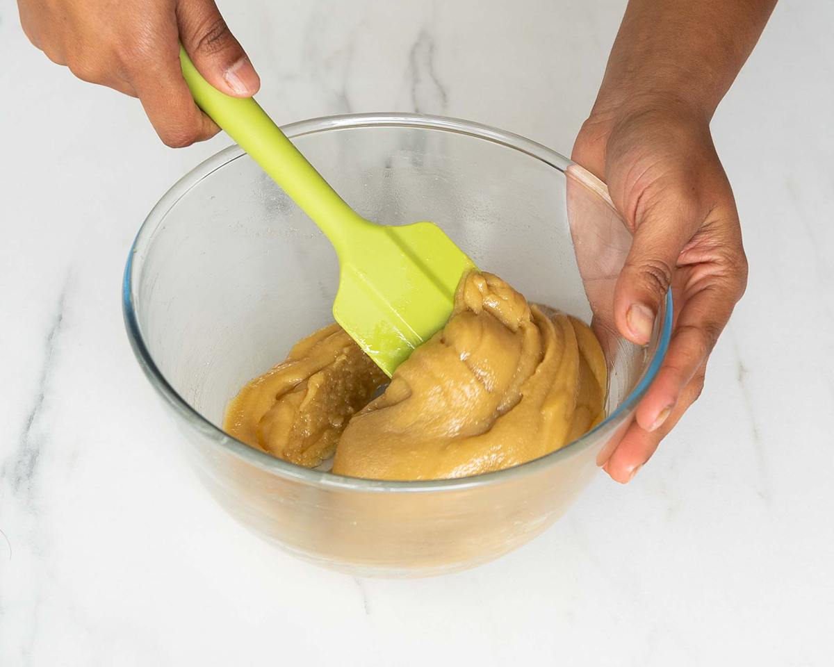 Mixing the melted ingredients together until combined and smooth. Recipe by movers and bakers