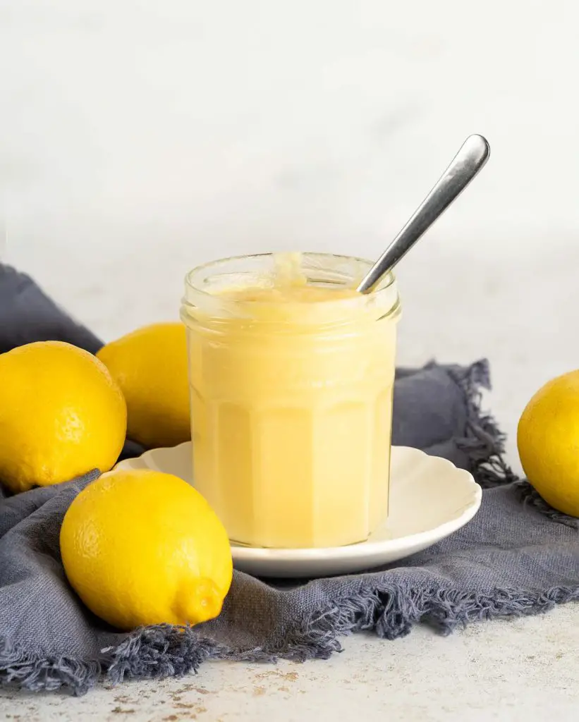 Lemon curd. A deliciously zingy, cream and rich curd, brilliant to use in bakes and to top pancakes, waffles and ice cream. Recipe by movers and bakers